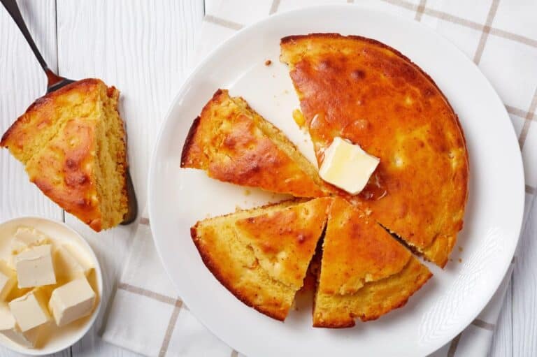 Freshly baked Cornbread topped with melted butter.