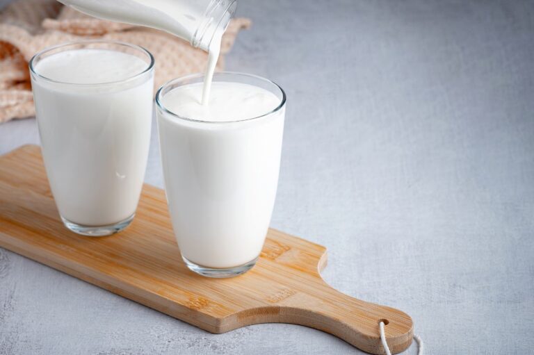 Pouring homemade buttermilk.