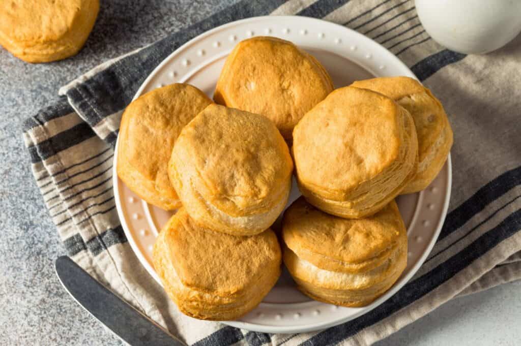 Homemade Southern Buttermilk Biscuits with Butter and Honey.