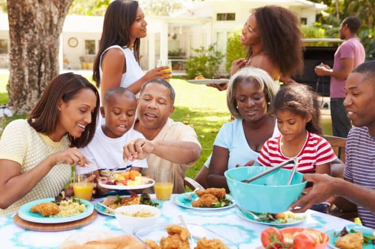 Multi Generation Family Enjoying Meal.