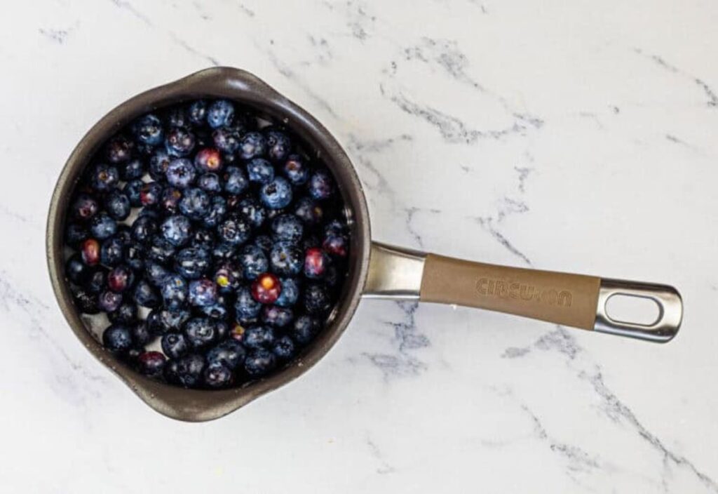 Image of fresh blueberries in a pot.