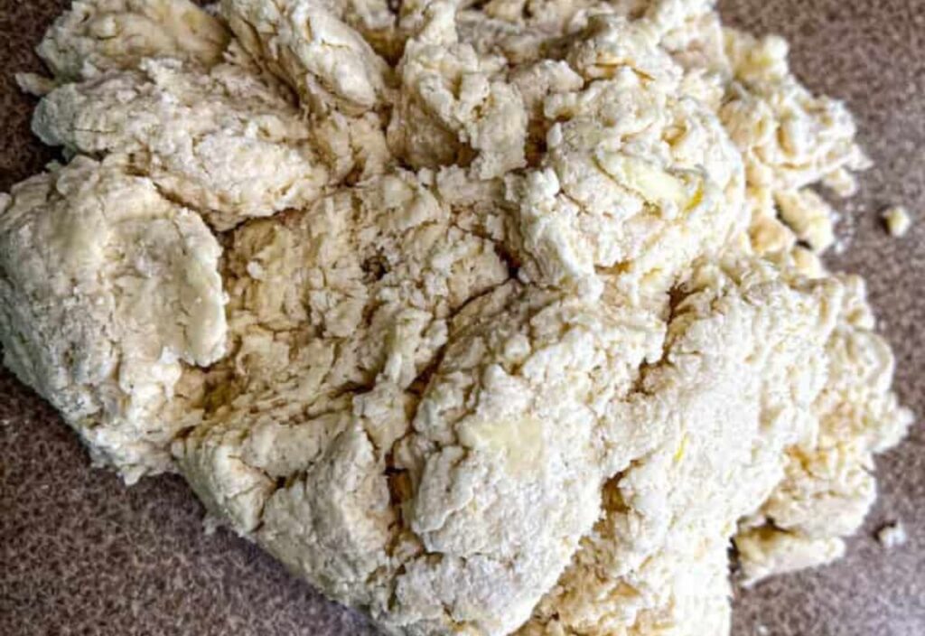 Image of dough that looks rough and uncooked.