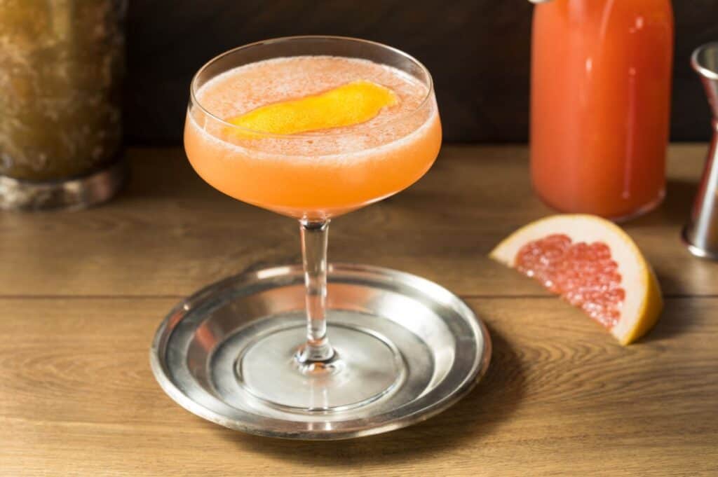 Boozy refreshing brown derby cocktail with bourbon and grapefruit.