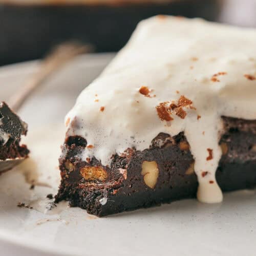 Delicious Mississippi Mud Pie served with a dollop of whipped cream.