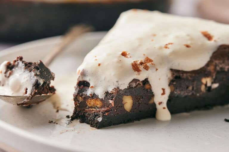 Delicious Mississippi Mud Pie served with a dollop of whipped cream.