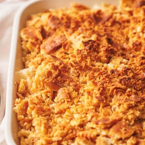 Baked pineapple casserole with crispy topping.