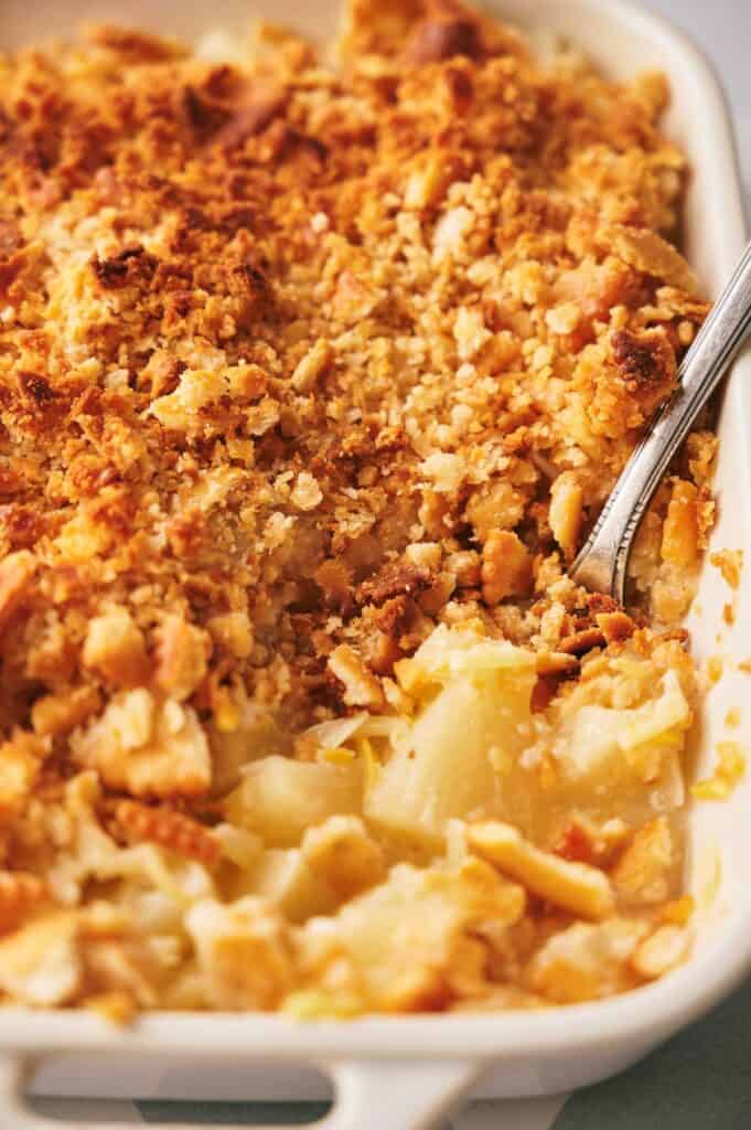 Close-up of a pineapple casserole in a baking dish.