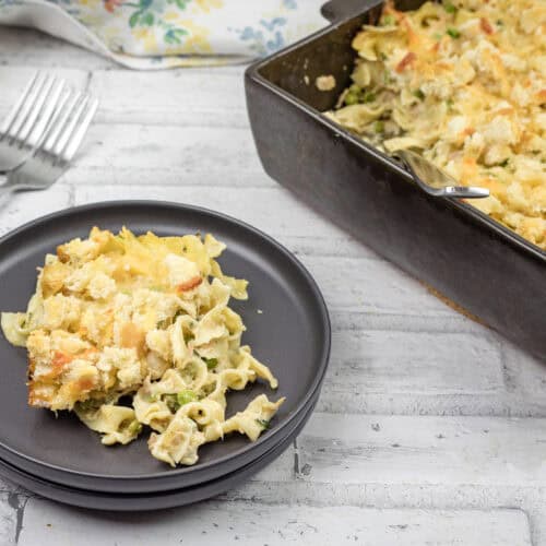 A hearty serving of tuna noodle casserole with melted cheese.