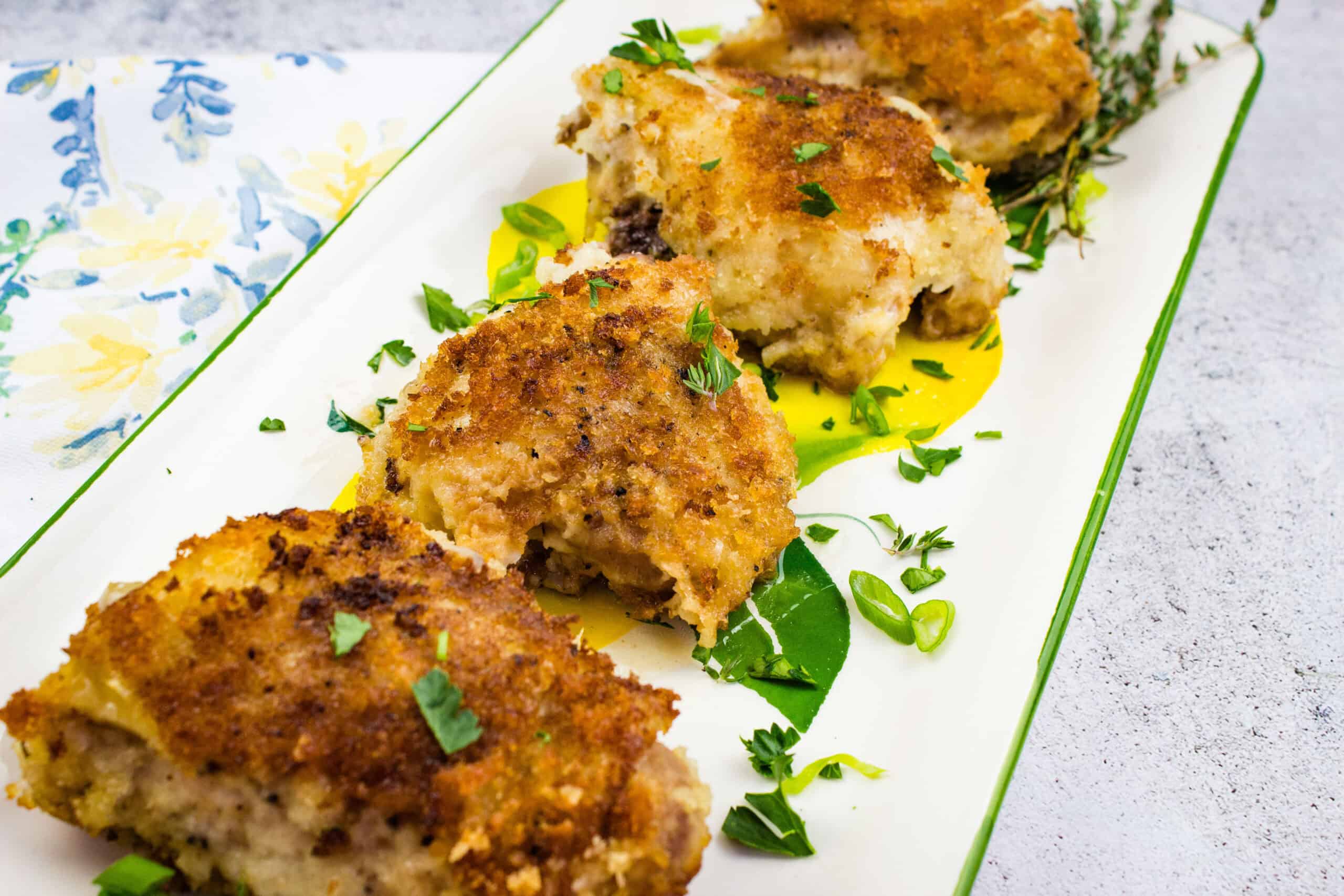 Golden-brown baked chicken thighs with creamy onion gravy.