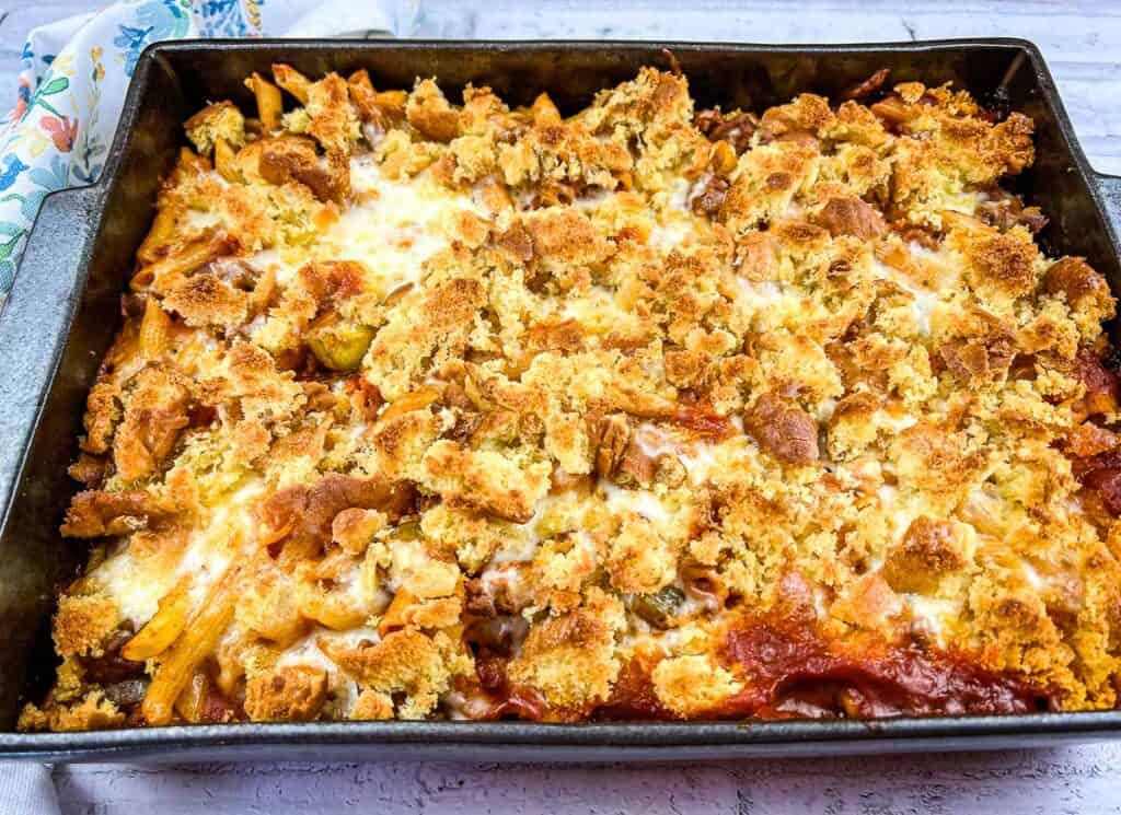 Baked sloppy joe casserole topped with melted cheese.