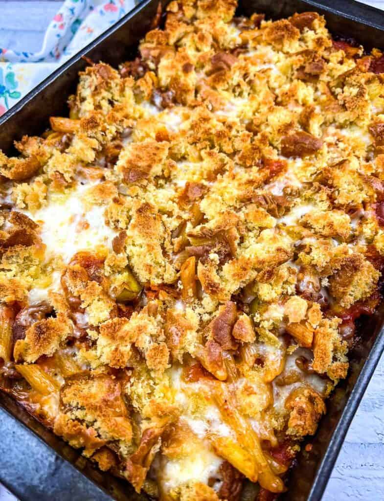 Close-up of sloppy Joe casserole with golden biscuit topping.