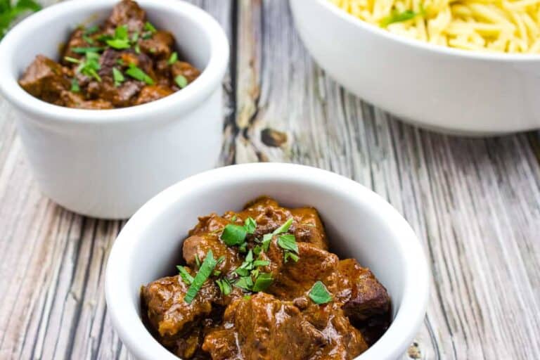 Hungarian Goulash in two white bowls.