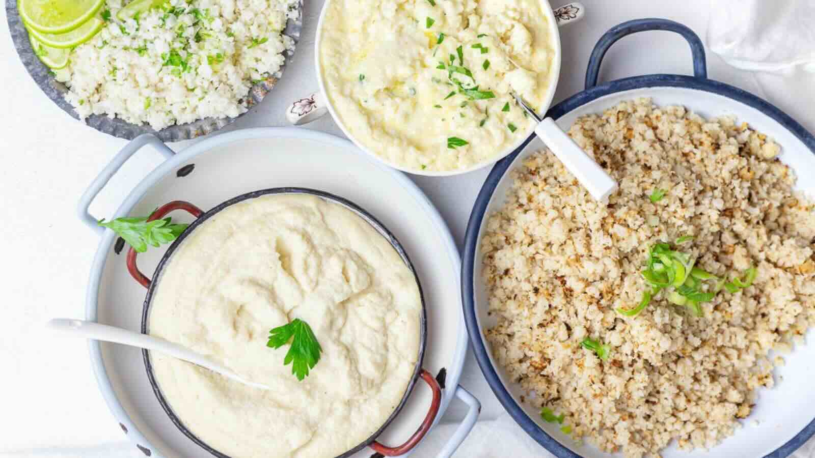 Various bowls of creamy cauliflower dishes.