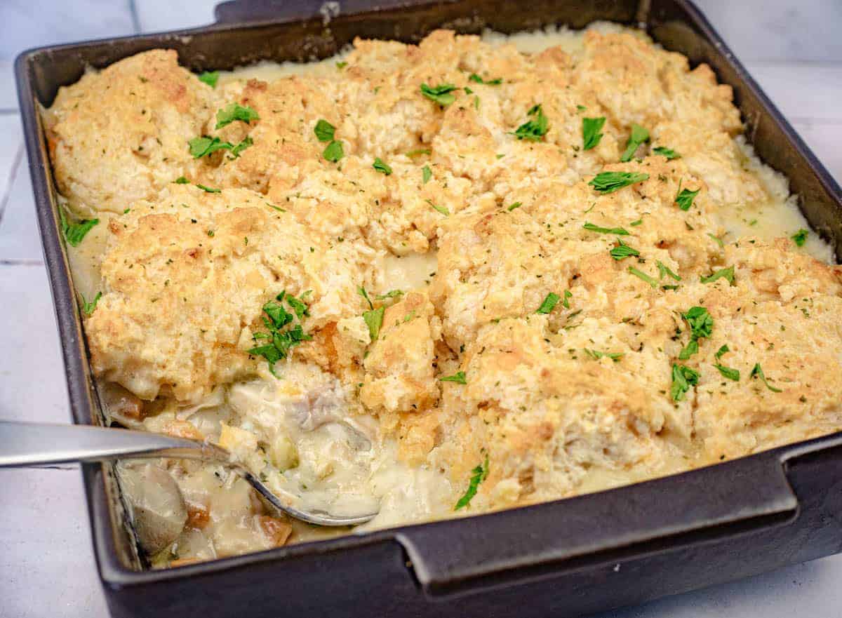 A casserole dish of Chicken Cobbler with Red Lobster Biscuit.