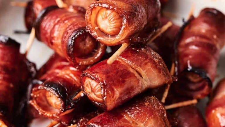 Bacon Wrapped Smokies with toothpicks and cooked to a crispy finish.