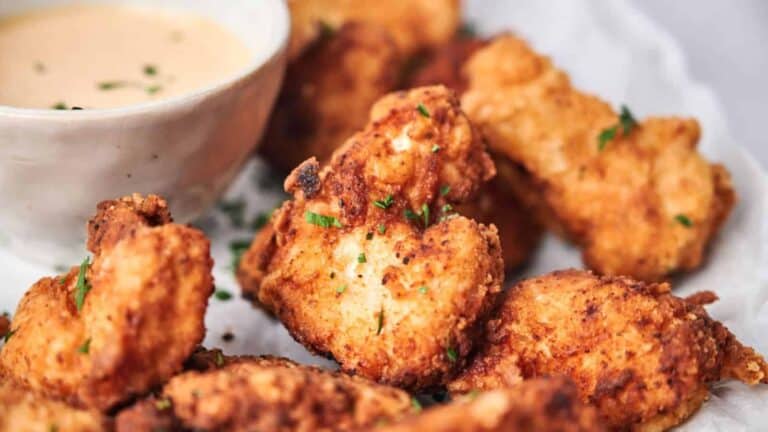 Chick-fil-A Nuggets with a bowl of white sauce.