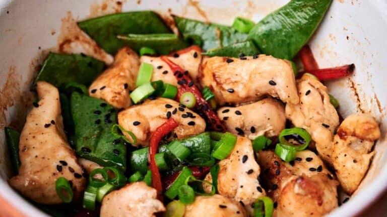 Kung Pao Chicken with black sesame seeds on a bowl.