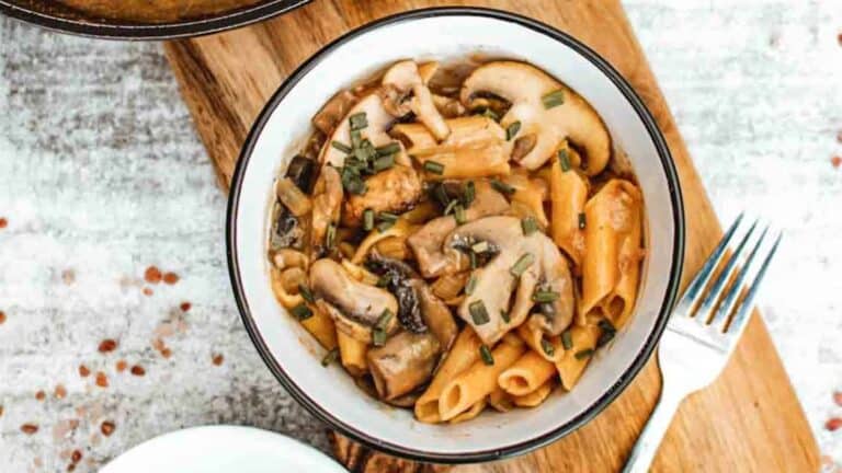 Creamy Vegan Mushroom Stroganoff on a white bowl.