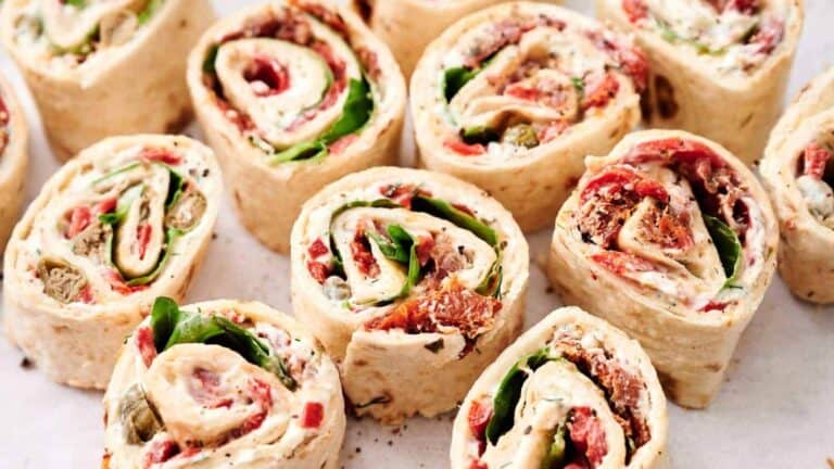 Pinwheel Sandwiches on a white surface.