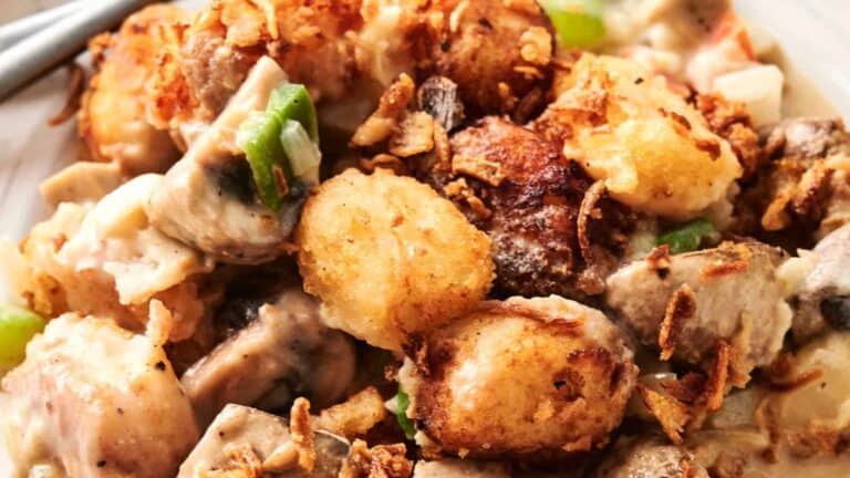 Vegan Tater Tot Casserole topped with fried onions.