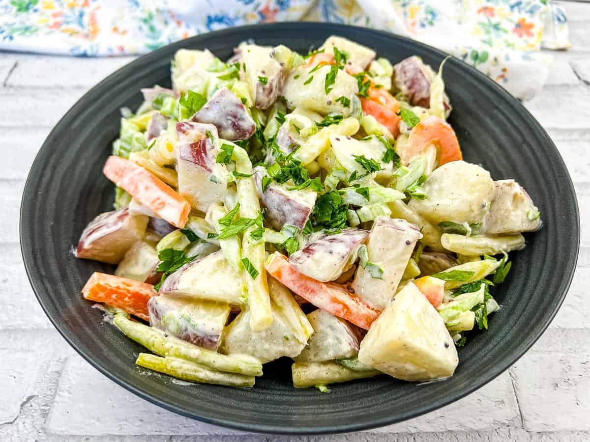 A bowl of yellow bean and potato salad.