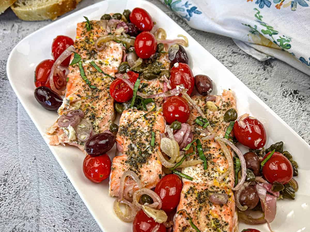 Mediterranean Salmon on a white rectangular plate.