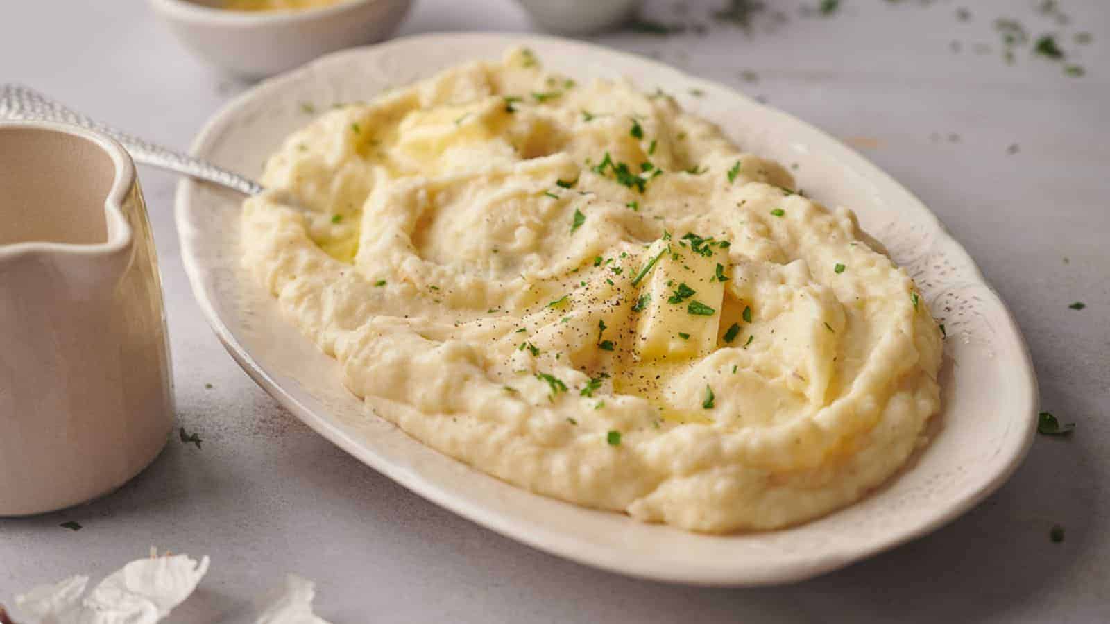 Mashed potatoes on a white plate.