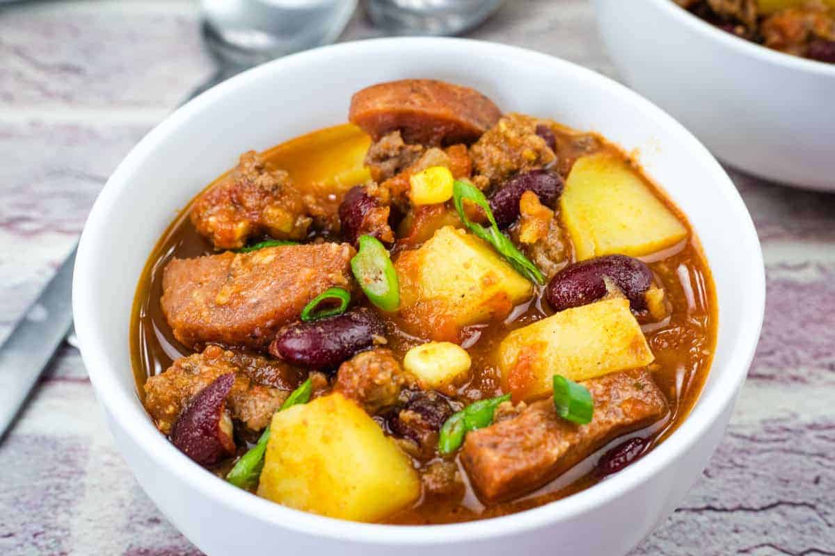 A white bowl of Texas cowboy stew.