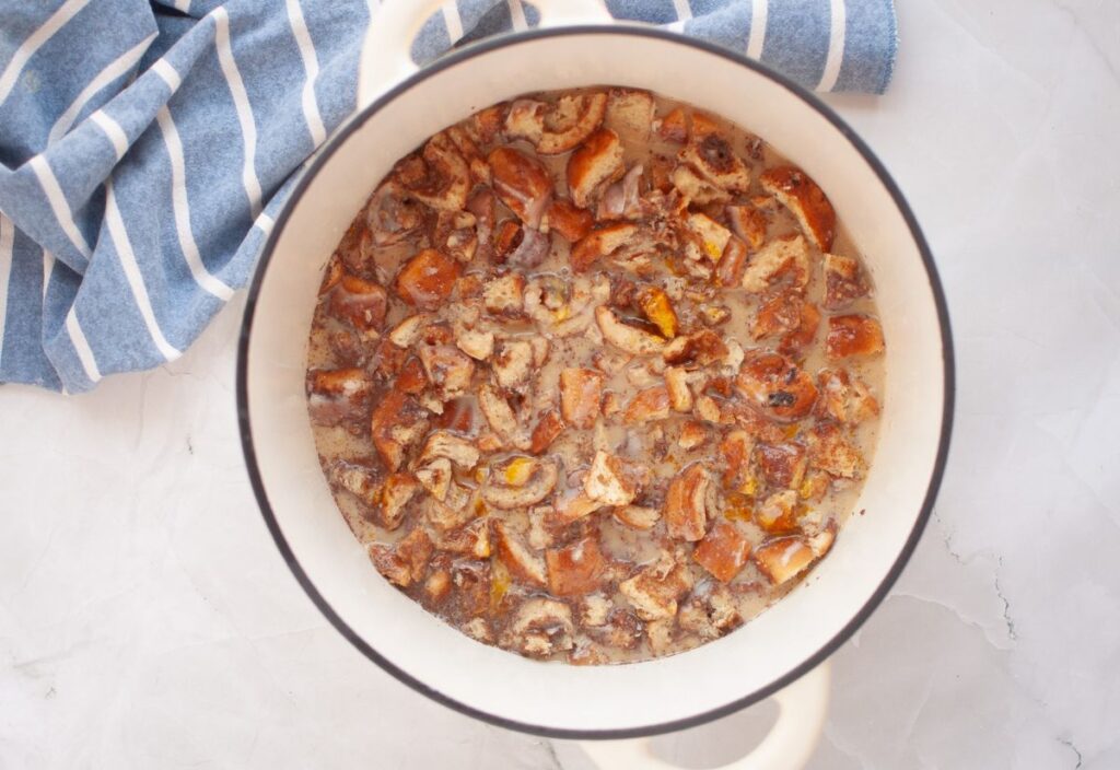 Raw mixture of chopped cinnamon rolls soaked in the custard base.