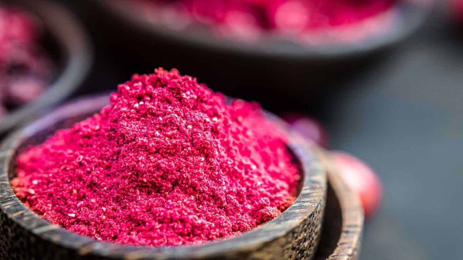 Cranberry Powder inside wooden bowl.