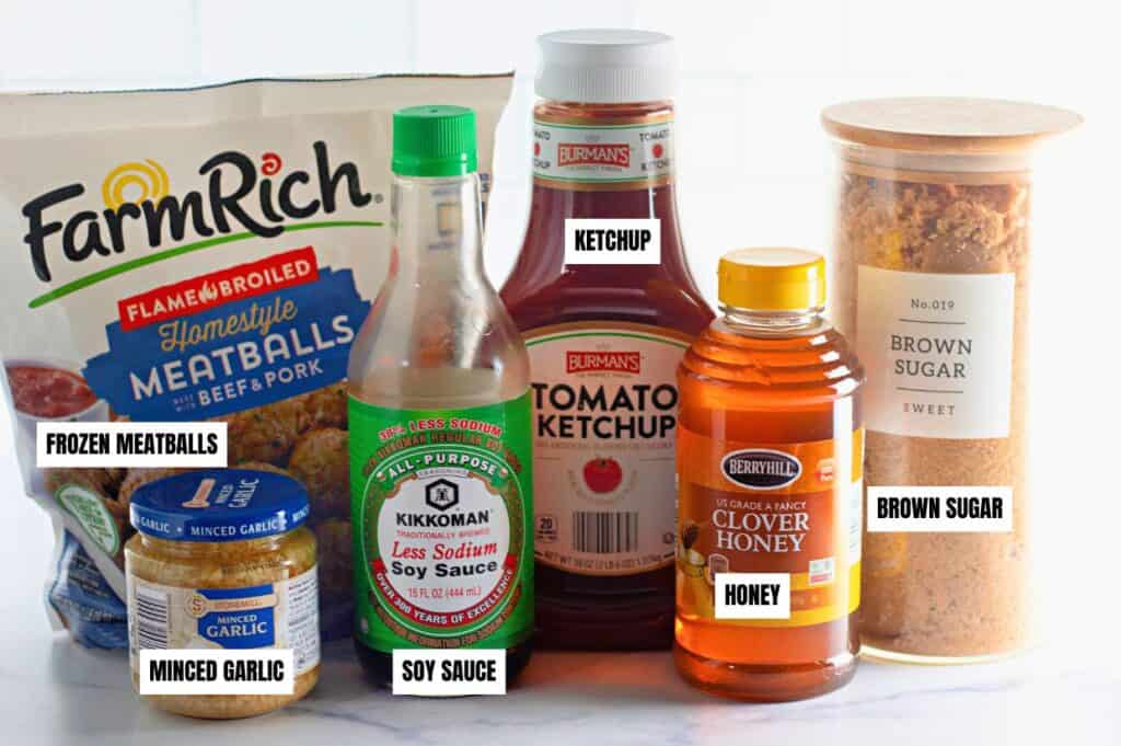 A collection of ingredients for honey garlic meatballs displayed on a countertop.