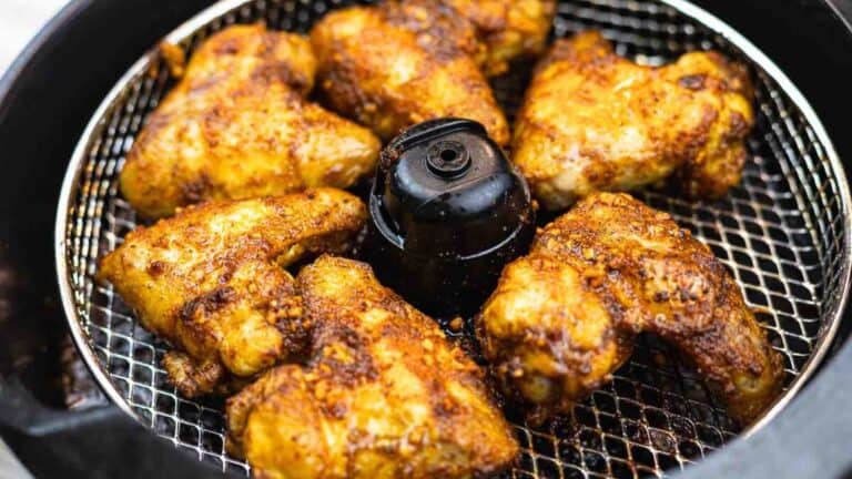Crispy and golden chicken wings cooked in an air fryer.