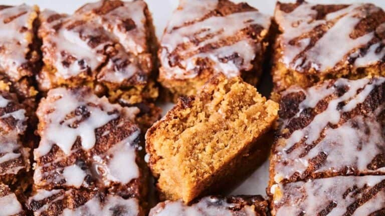 Sweet and warm cinnamon sugar blondies with a soft texture, drizzled with a simple glaze for extra sweetness.