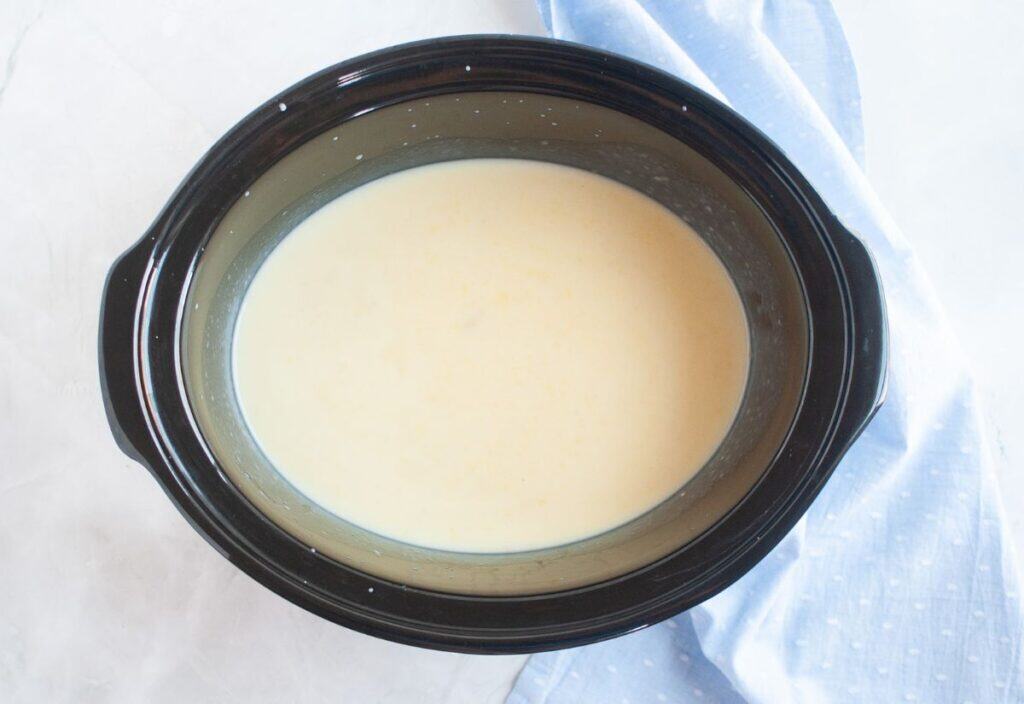 The soup mixture in the slow cooker thinned out after adding milk.